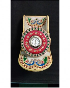 Clock with holder